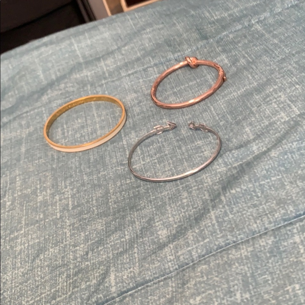 3 bracelets 2 are Kate spade